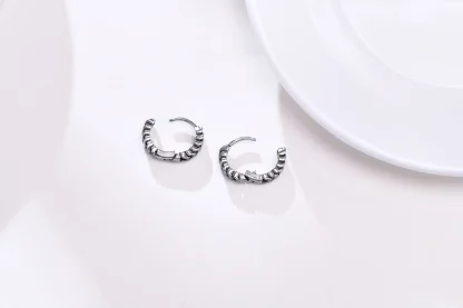 Thick Huggie Earring with Embossed Design - Image 7