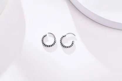 Thick Huggie Earring with Embossed Design - Image 5
