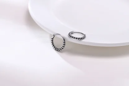 Thick Huggie Earring with Embossed Design - Image 6